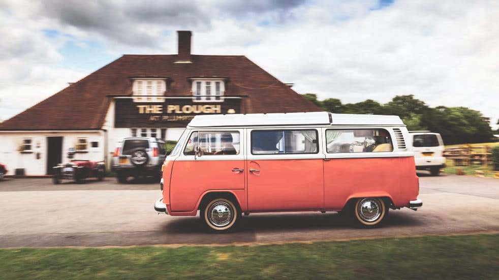vw vintage camper in front